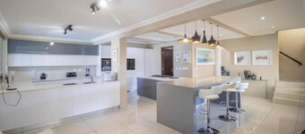 Spacious 6-bedroom house with swimming pool,  WiFi and AC in  Sandton.