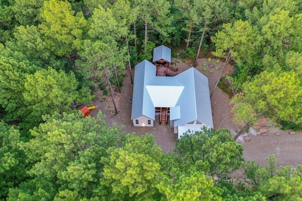 Our cozy cabin nestled in the pines