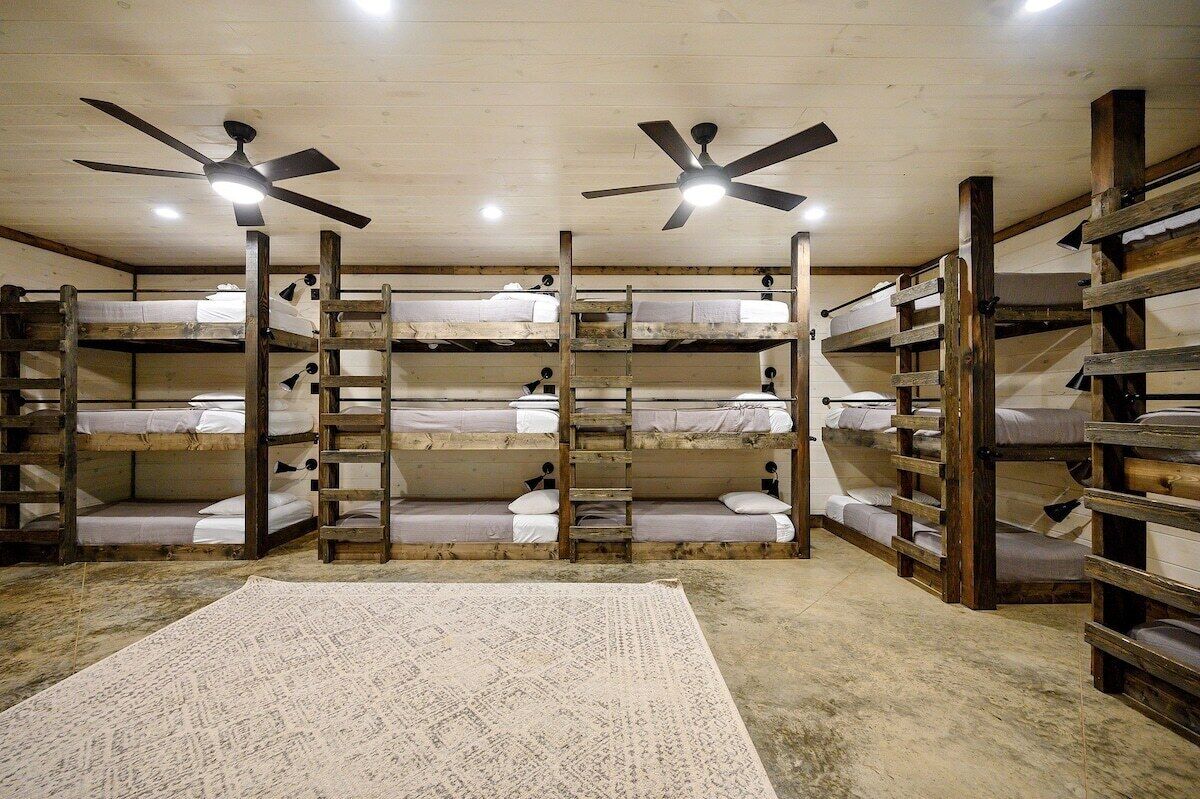 Downstairs bunk room sleeps 18 guests in twin-sized beds