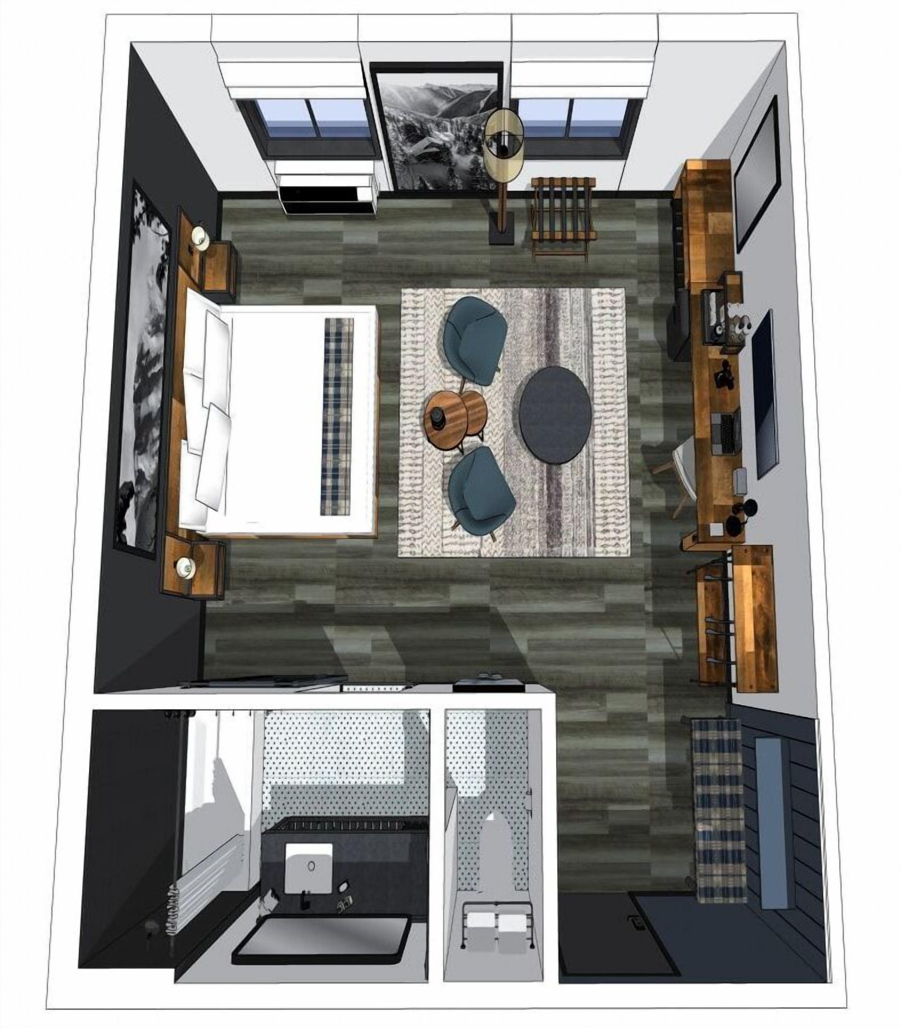 A modern, compact living space with a central seating area, a kitchenette, a small bathroom, and a bedroom with a large window.