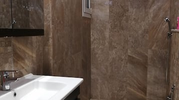 Shower, towels, soap, shampoo