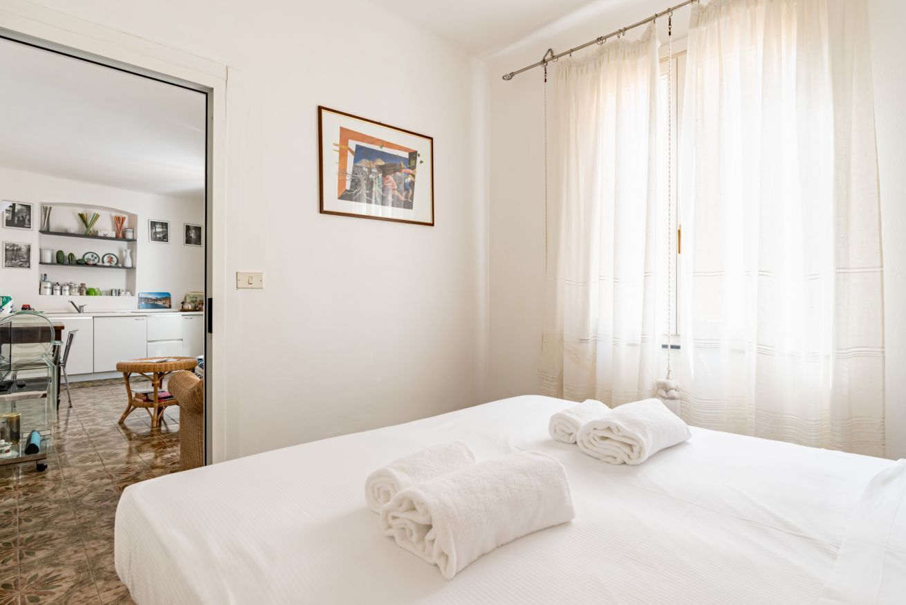2 slaapkamers, een strijkplank/strijkijzer, beddengoed