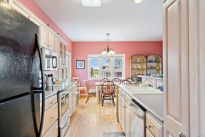 Fridge, microwave, oven, stovetop - Taylor House by Carolina Getaway - 4BR/3BA Home w/ Intracoastal & Ocean Views (Wrightsville Beach)