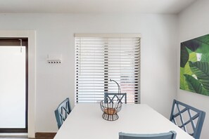 Dining - Condo near the beach with patio, firepit, W/D, AC and wifi (Riviera Beach)