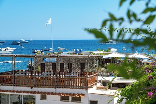 Luxurious Beach House with AC in Capri. Stunning views & steps from the beach