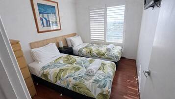 2 slaapkamers, een strijkplank/strijkijzer, internet, beddengoed