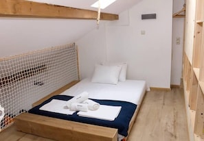 1 bedroom, desk, iron/ironing board, travel cot