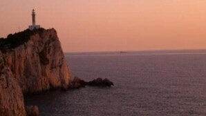 A coastal cliff with a lighthouse. - Studio Apartment 'Nontas Home 24' with Mountain View, Wi-Fi and Air Conditioning (Kalamitsi)