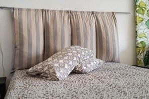 1 habitación, tabla de planchar con plancha, wifi gratis y ropa de cama 