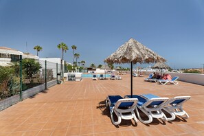 A heated pool - Vacation Apartment 'Adelfa Golf' with Mountain View, Shared Pool and Wi-Fi (Amarilla Golf)