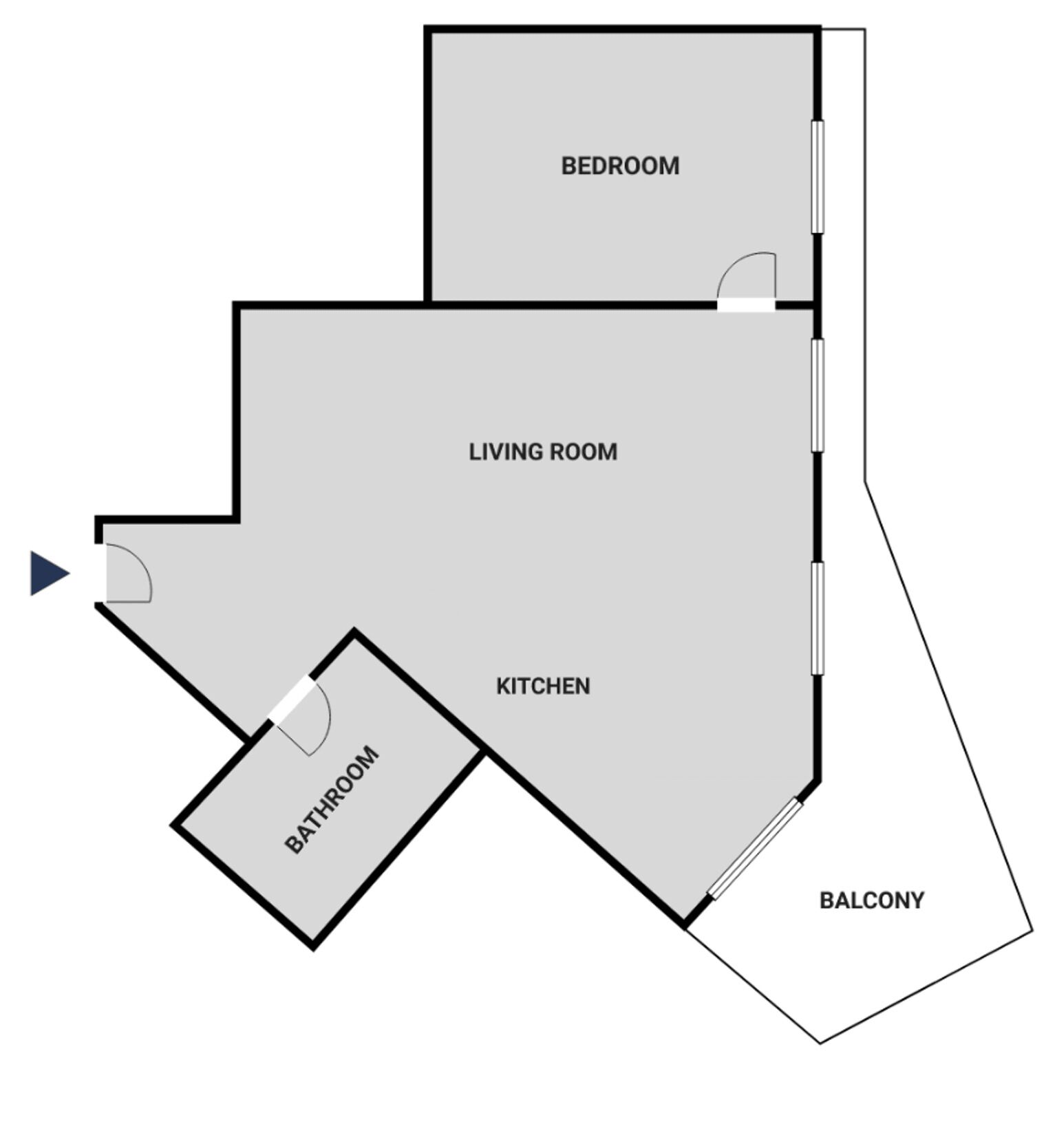 A floor plan with a bedroom, living room, kitchen, bathroom, and balcony.