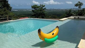 Outdoor pool, open 9:00 AM to 9:00 PM, sun loungers
