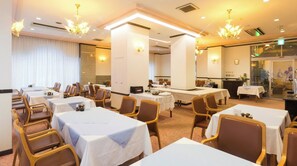 Guests can dine in style at this elegant dining area with comfortable seating and modern decor.