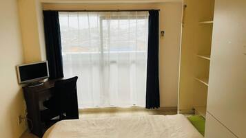 1 bedroom, desk, bed sheets