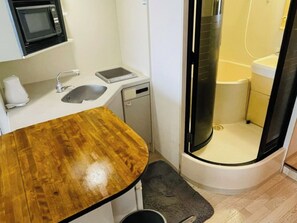 Fridge, microwave, stovetop, cookware/dishes/utensils