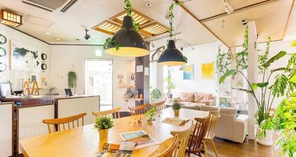 This guesthouse has a living room and four bedrooms and can be rented exclusively for your group / Nara Nara