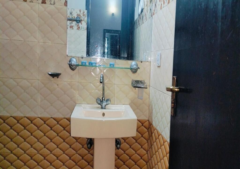 Shower, slippers, towels, soap