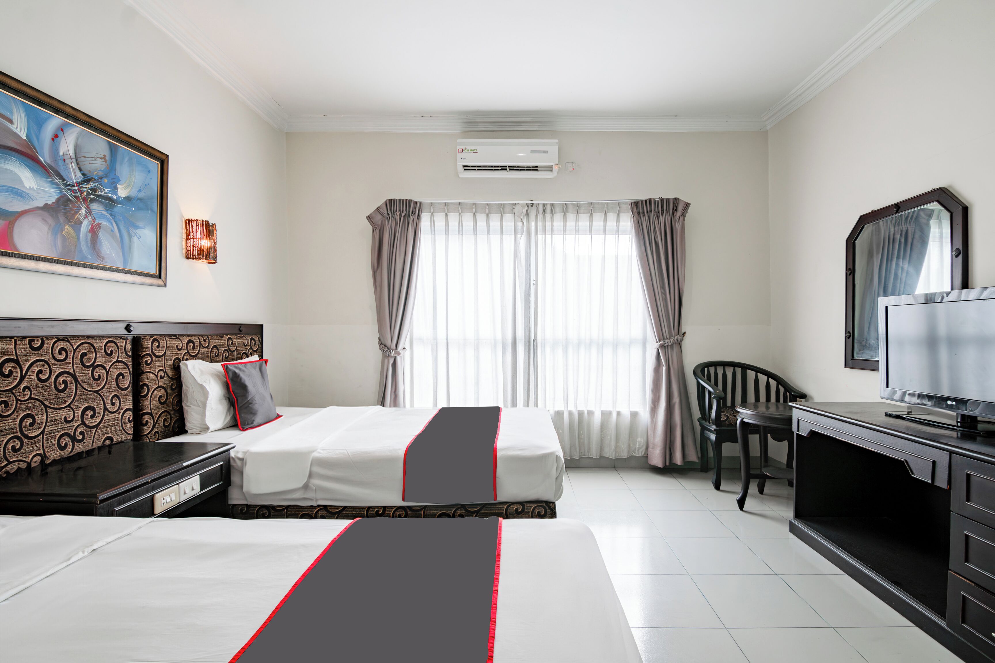 Foto - Collection O Senapelan Near Rsud Petala Bumi Formerly De Town Hotel