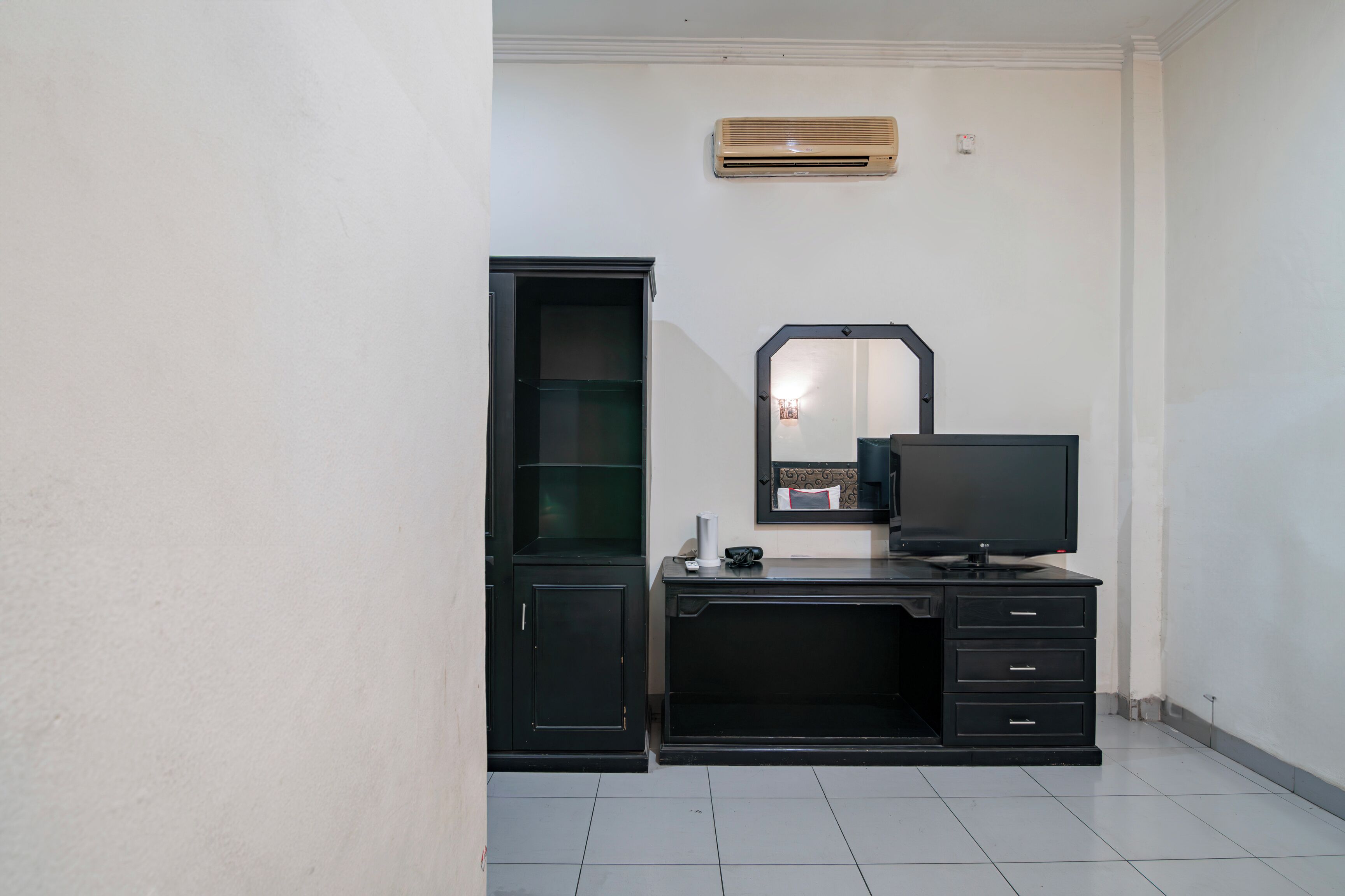 Foto - Collection O Senapelan Near Rsud Petala Bumi Formerly De Town Hotel