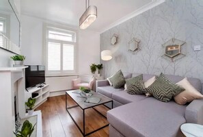 Casa | Área de sala de estar | Televisión de pantalla plana 