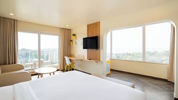 Signature Suite | In-room safe, desk, laptop workspace, soundproofing