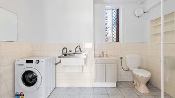 Shower, towels, soap, toilet paper