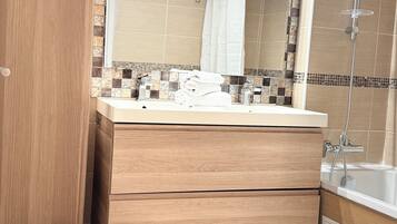 Hair dryer, towels, soap, shampoo