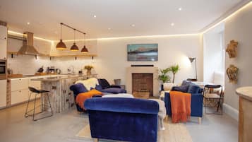 Higgihaus Apt 1 #36-37 Royal York Crescent | Living area | Flat-screen TV