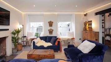 Higgihaus Apt 1 #36-37 Royal York Crescent | Living area | Flat-screen TV