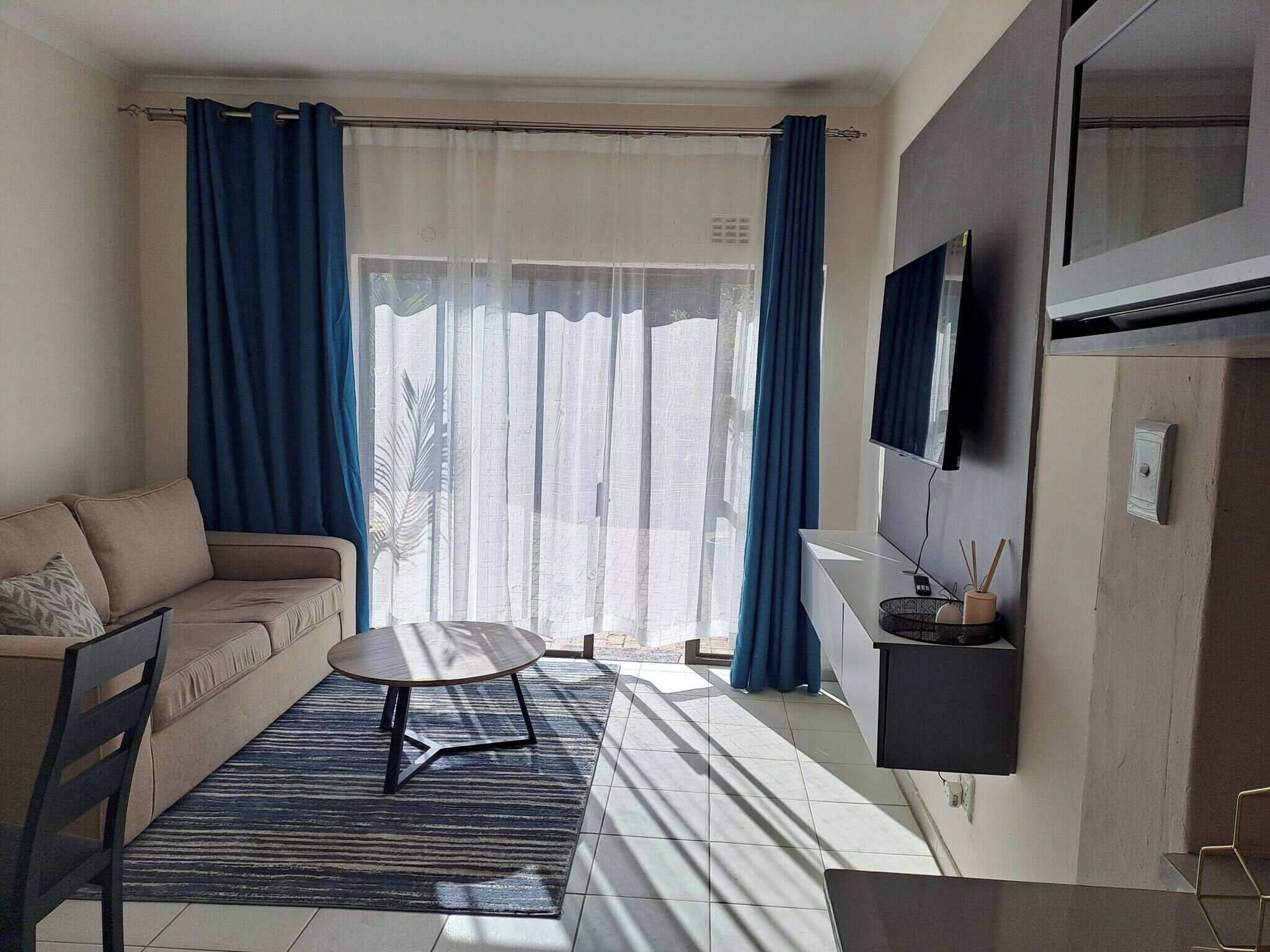 Appartement, 1 chambre, patio, vue jardin | Coin séjour