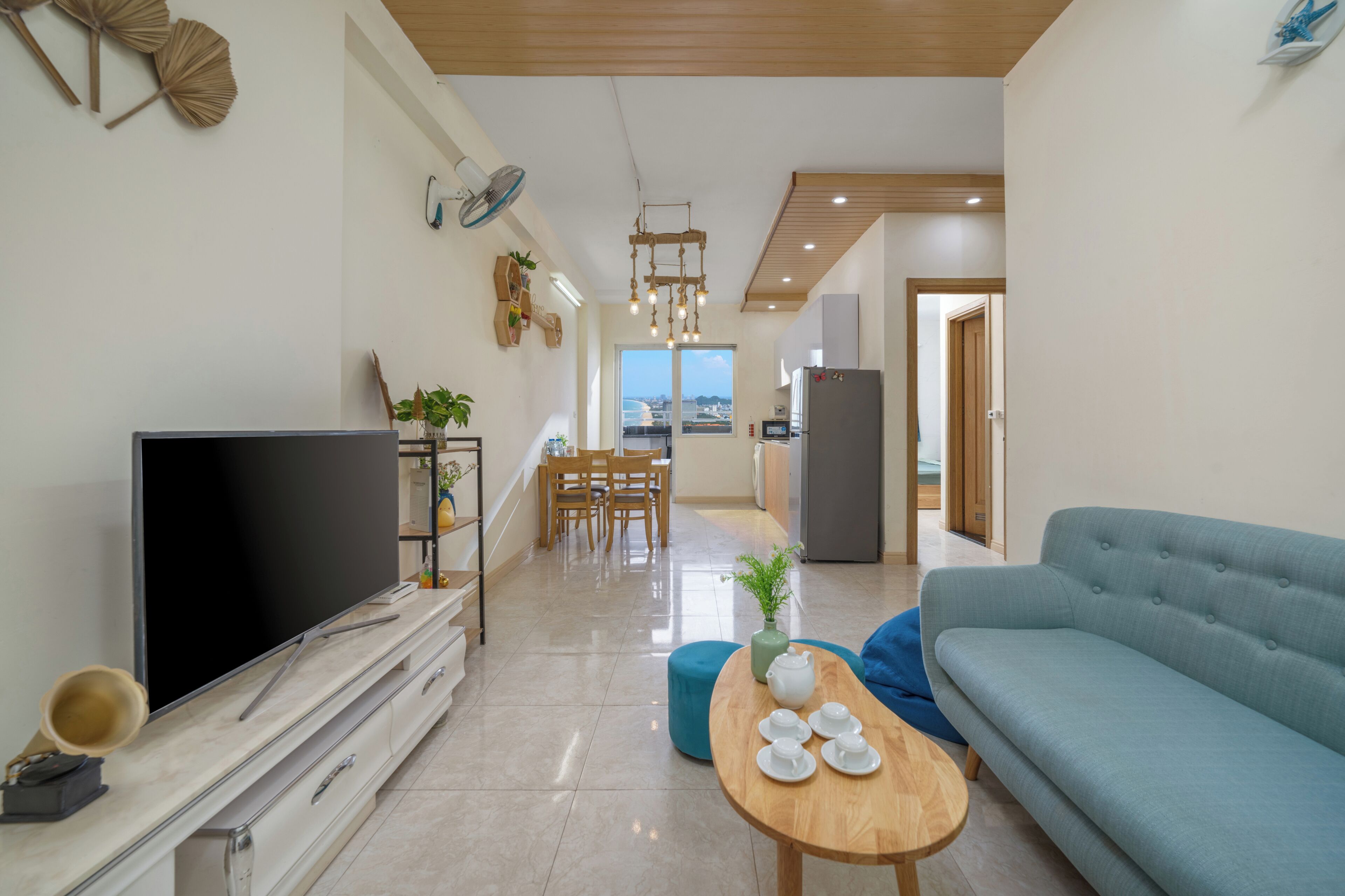 Deluxe Apartment, Sea View | Living area | Smart TV