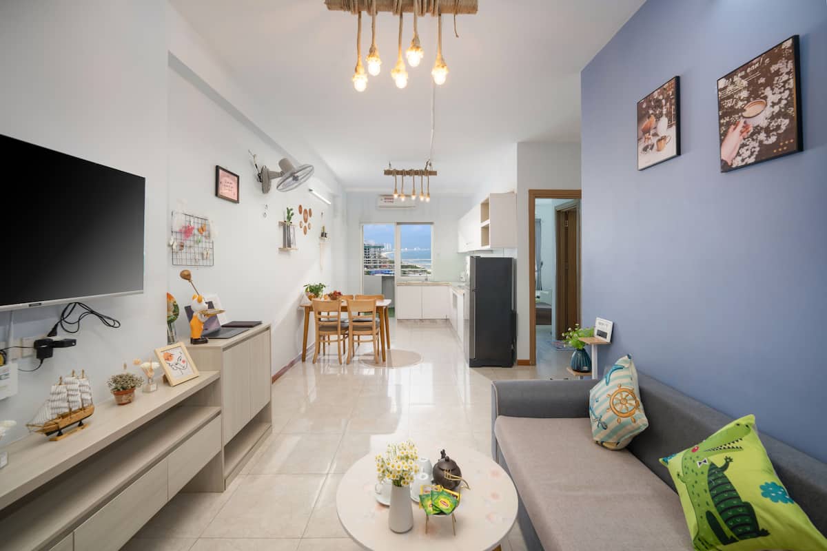 Deluxe-Apartment, Meerblick | Wohnbereich | Smart-TV