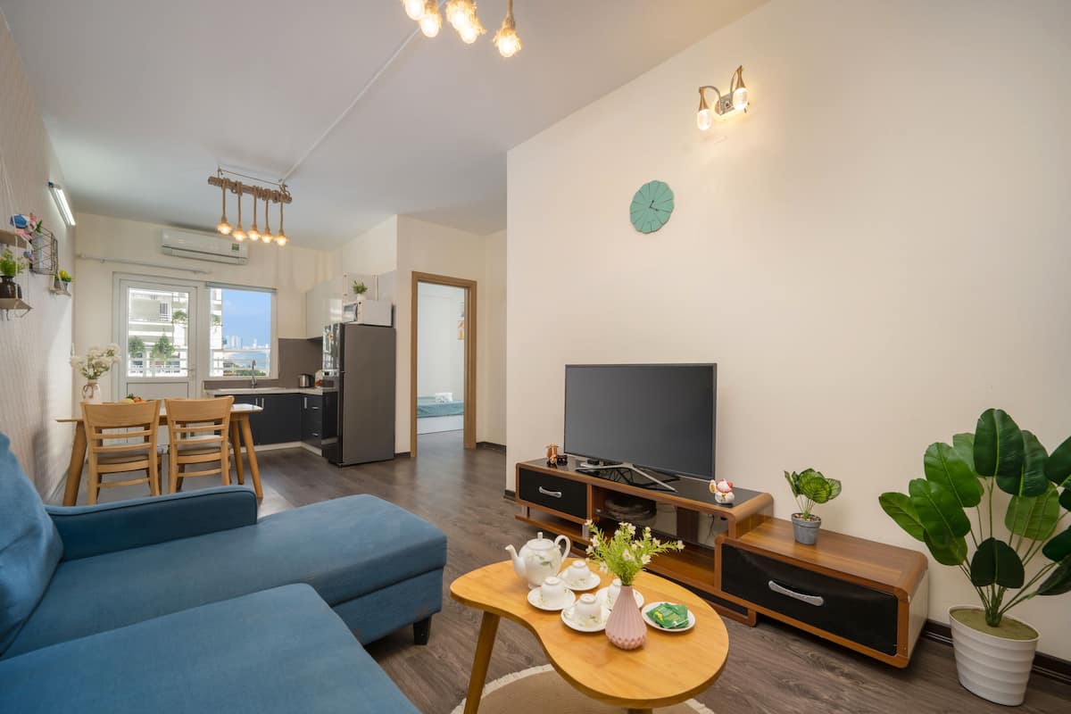 Deluxe-Apartment, Meerblick | Wohnbereich | Smart-TV