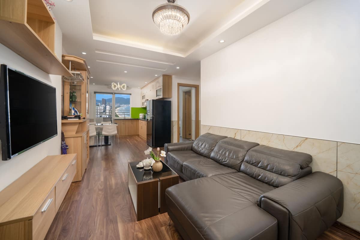 Deluxe-Apartment, Meerblick | Wohnbereich | Smart-TV
