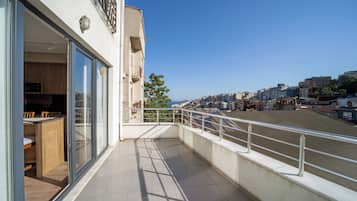 Deluxe Suite, 1 Queen Bed with Sofa bed, Sea View | Terrace/patio