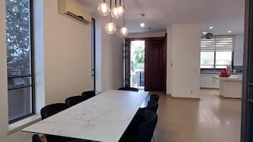 Villa, Patio, Garden View | In-room dining