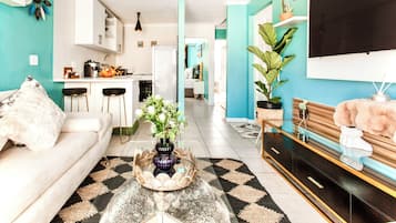 Family Apartment, Partial Ocean View | Iron/ironing board, free WiFi