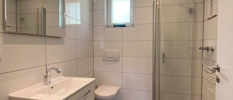 Dusj, hårføner, bidé og håndklær