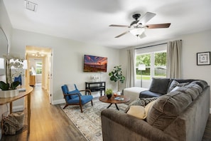 TV, table football, offices - The Canopy on 10th | Game Room • Pets • Pergola (Gainesville)
