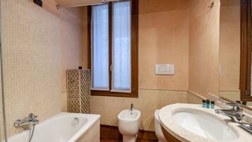 Hair dryer, towels, soap, shampoo