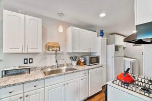 Fridge, microwave, oven, stovetop - Spacious Retreat with Hot Tub, Patio & King Bed (Olympia)