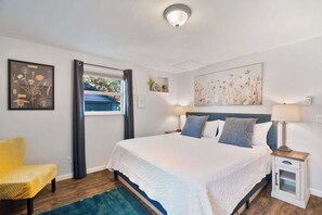 1 bedroom, desk, iron/ironing board, travel crib