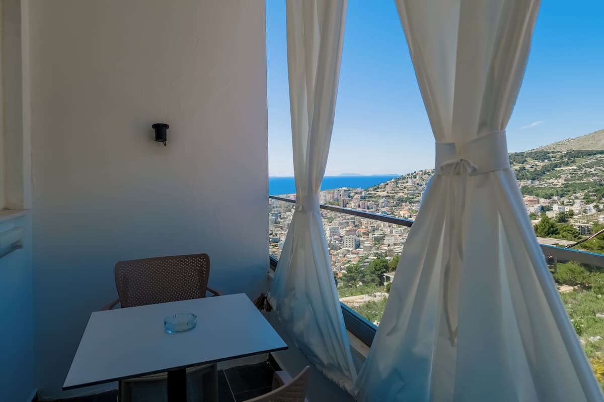 Elite Double Room, 1 King Bed with Sofa bed, Sea View | Balcony view