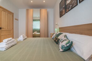 2 chambres, fer et planche à repasser, Wi-Fi, draps fournis