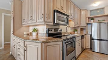 Condo, 1 Bedroom | Private kitchen | Dishwasher, cookware/dishes/utensils
