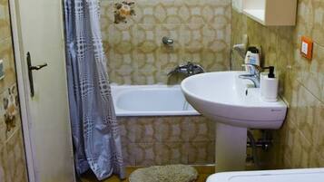 Hair dryer, bidet, towels, soap