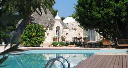 Trulli Mimosa by Pugliadamare
