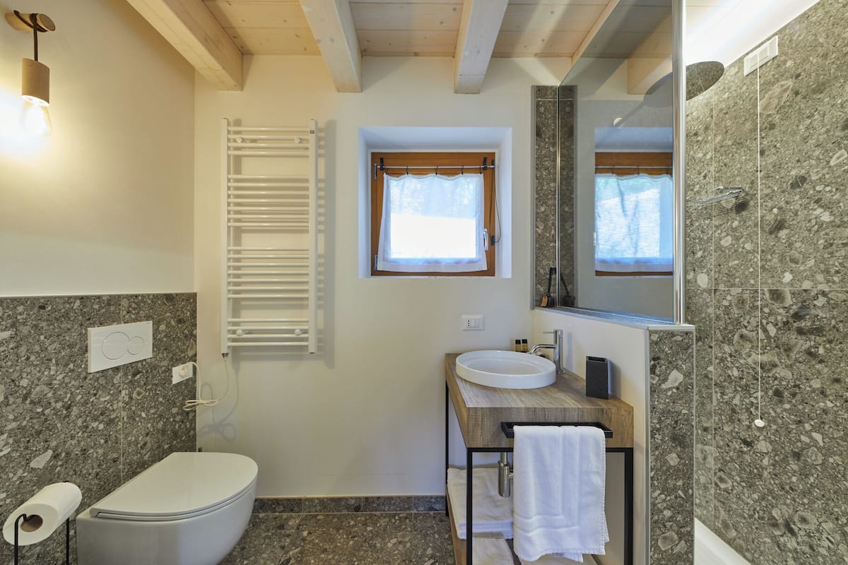 Panoramic Double Room, 1 Queen Bed, Garden View | Bathroom | Shower, rainfall showerhead, free toiletries, hair dryer
