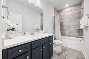 Hair dryer, towels, soap, shampoo