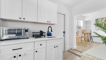 Fridge, microwave, coffee/tea maker, electric kettle